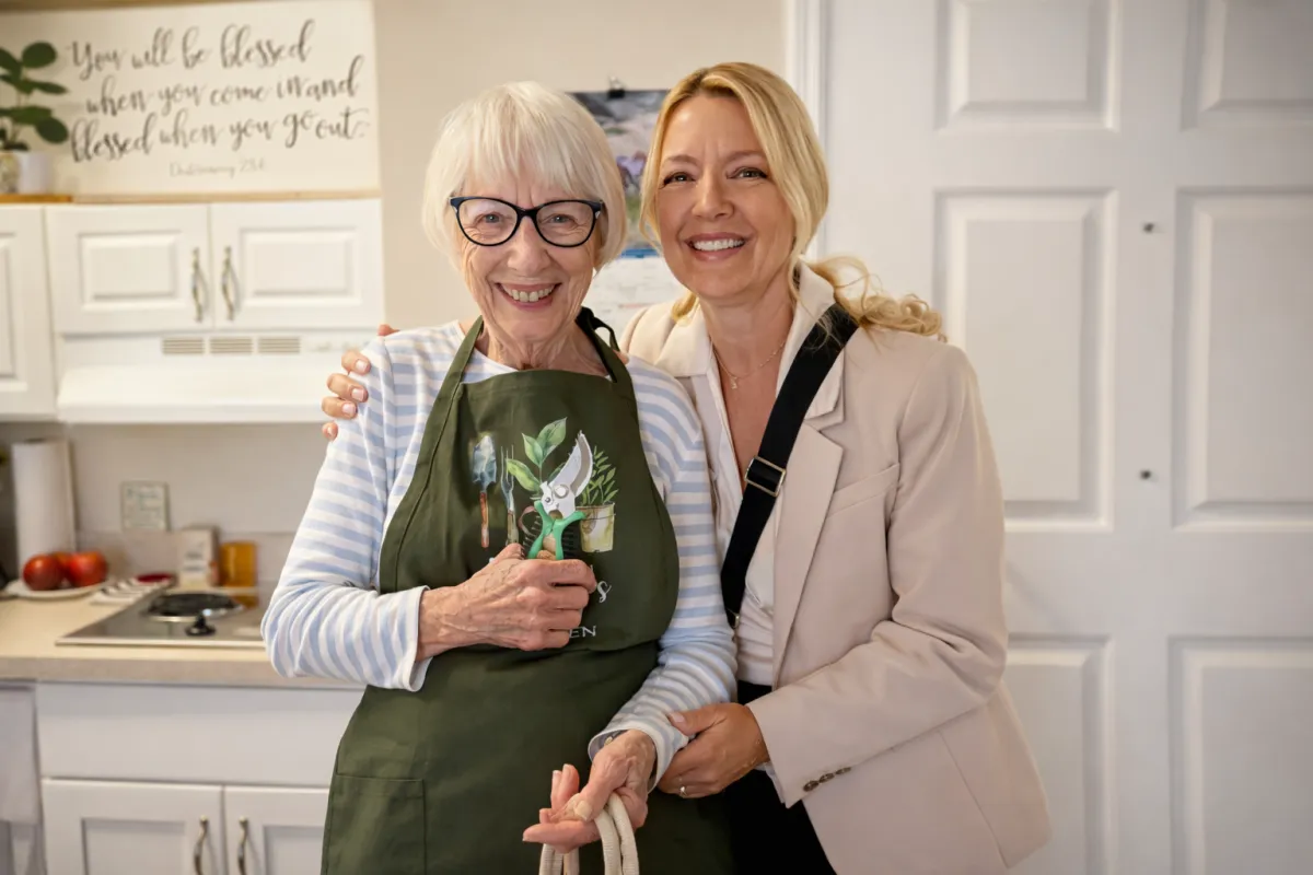 a kitchen with three stools and a center island
