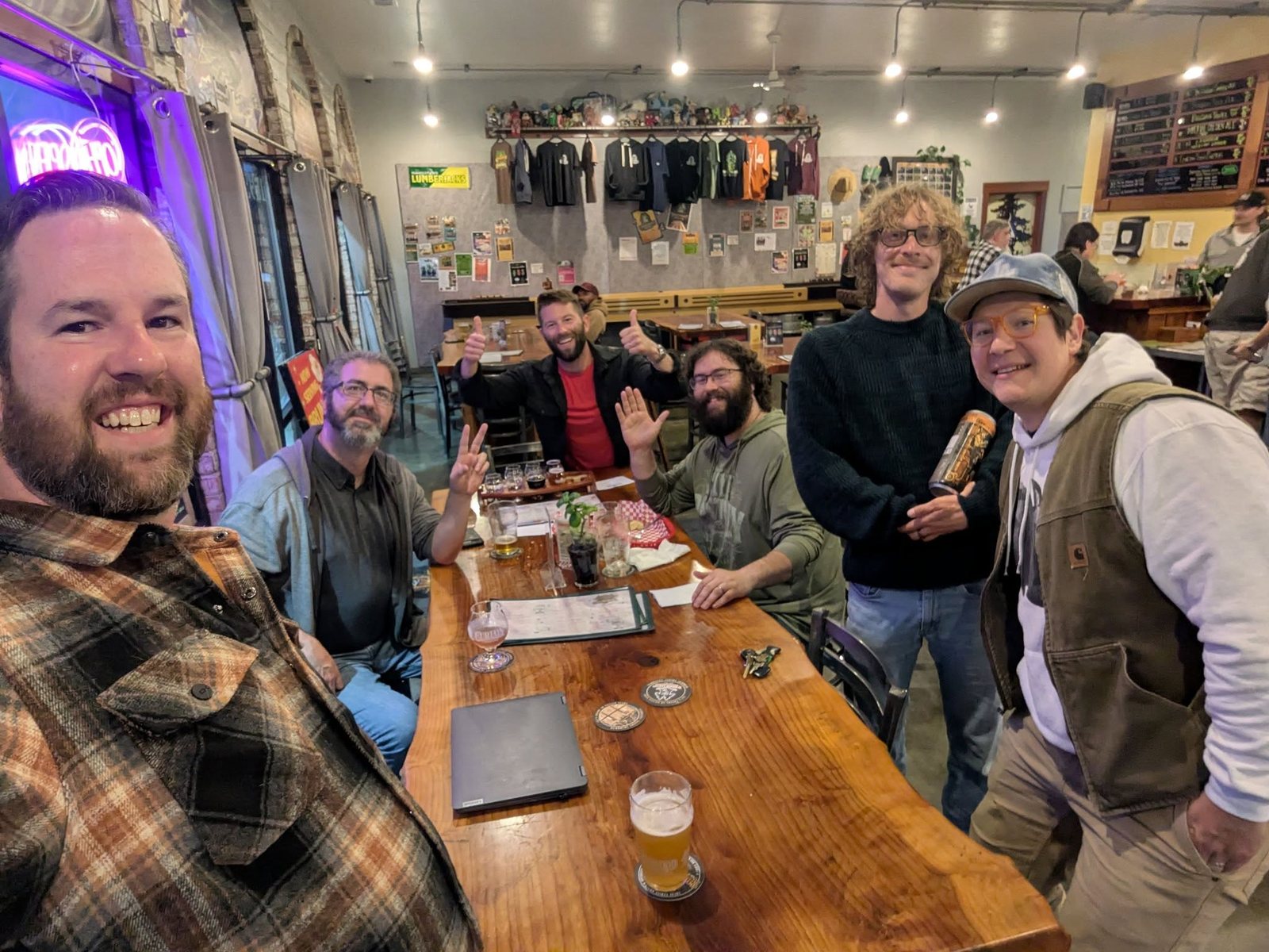 A long table of dads at a Fathers Eve gathering
