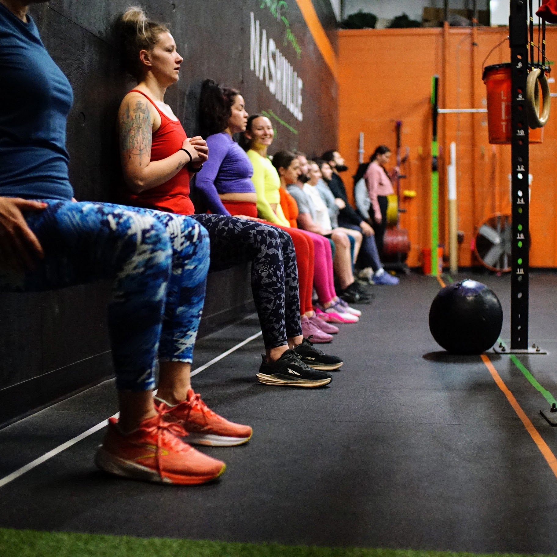 Beginner CrossFit class learning movements