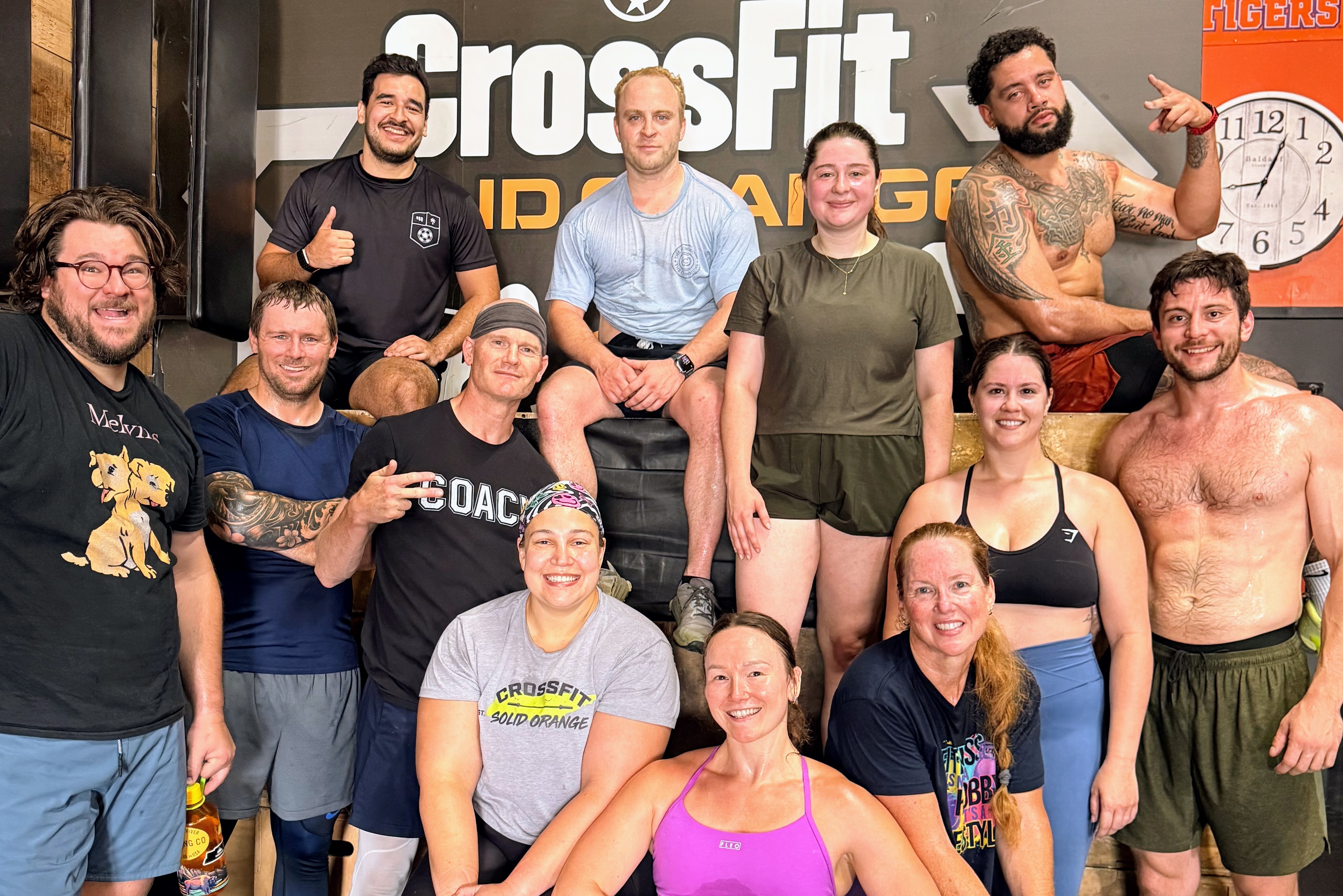 Beginner CrossFit class learning movements