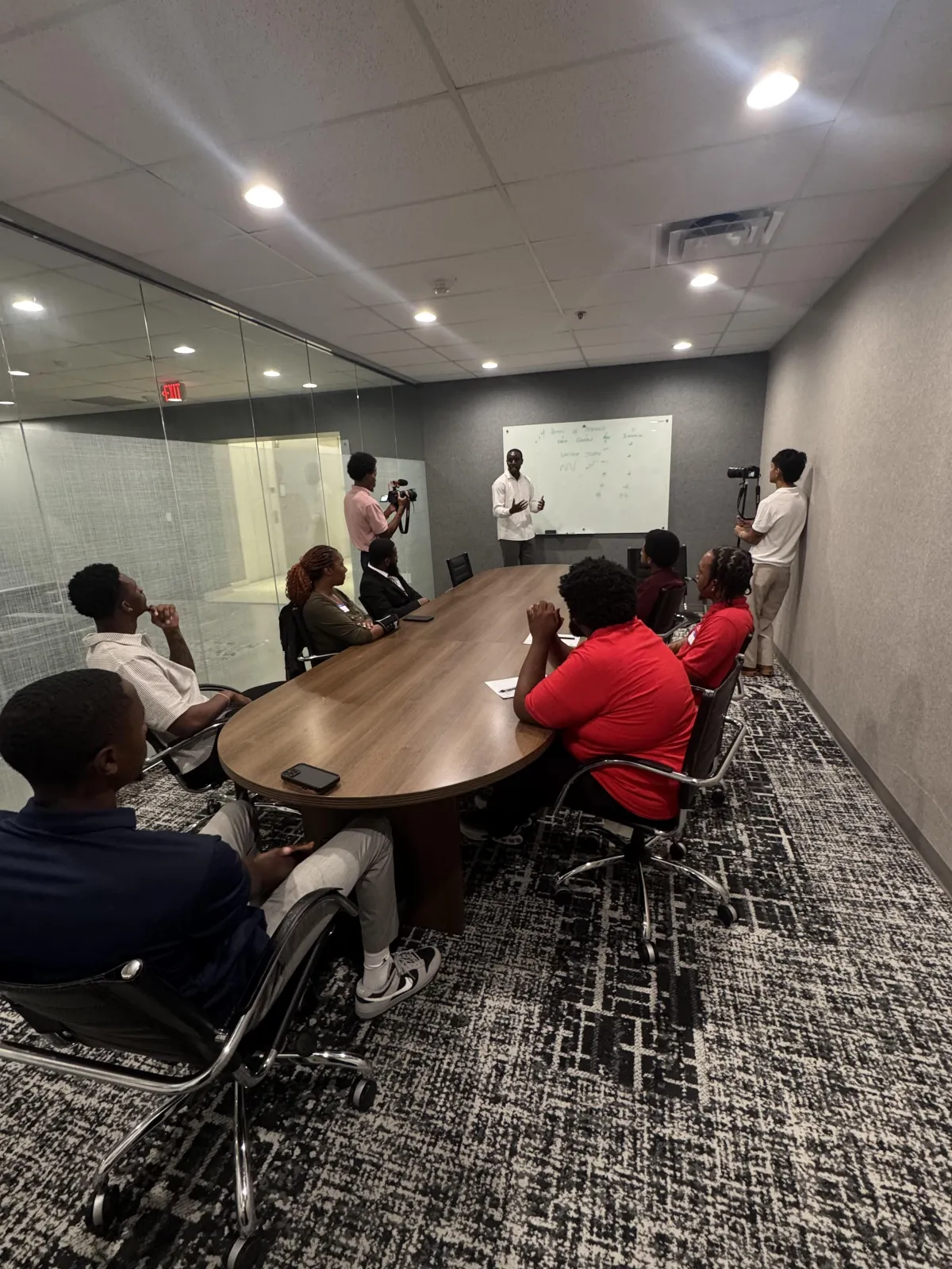 sittin people beside table inside room