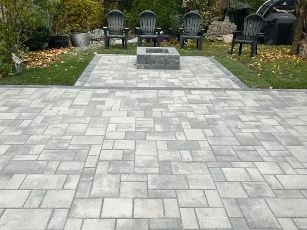 Custom armour stone entrance installation and front landscaping project by Big G Landscapes in Barrie, ON