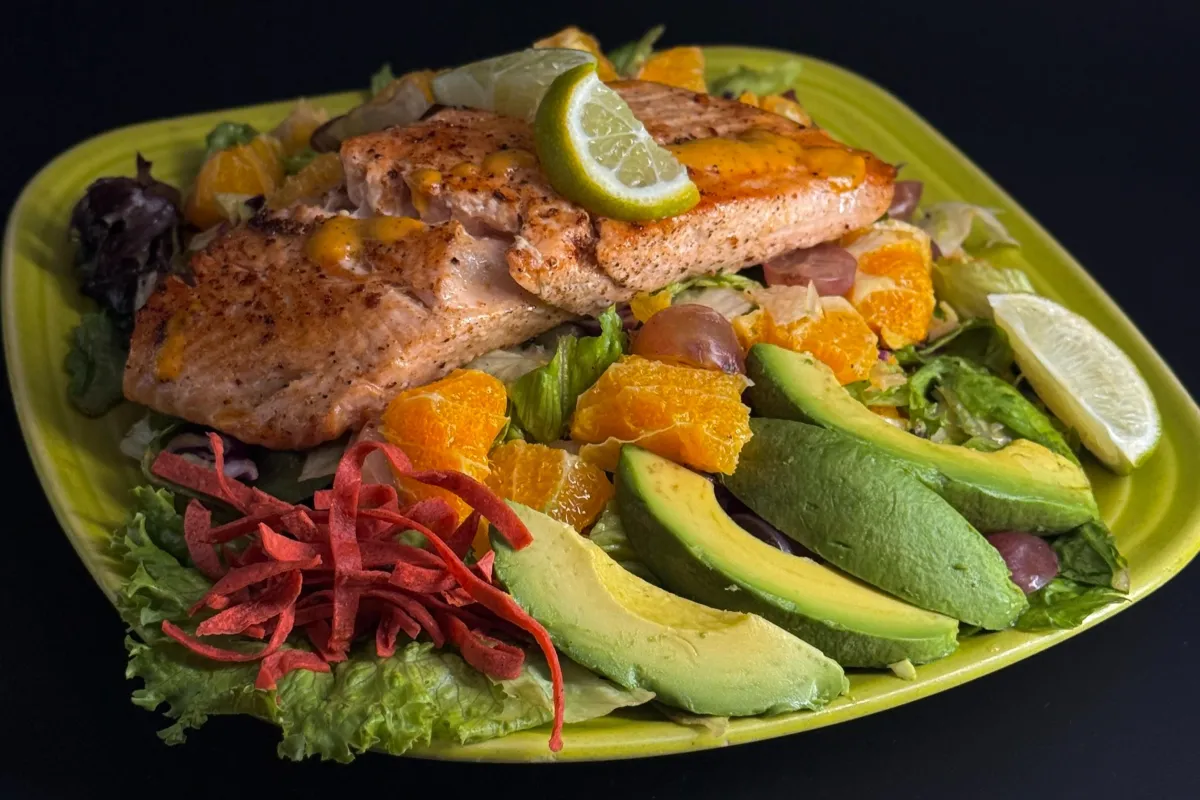 Grilled salmon salad with avocado and citrus