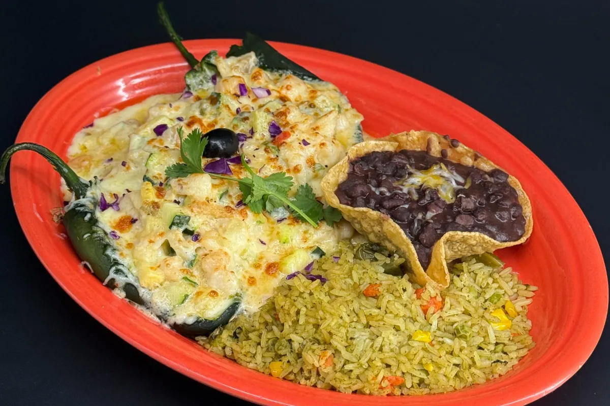 Mexican Trio: Our dipping trio consists of fresh guacamole, jalapeño cheese sauce, and a Mexican bean dip made with salsa Quemada and melted cheese.