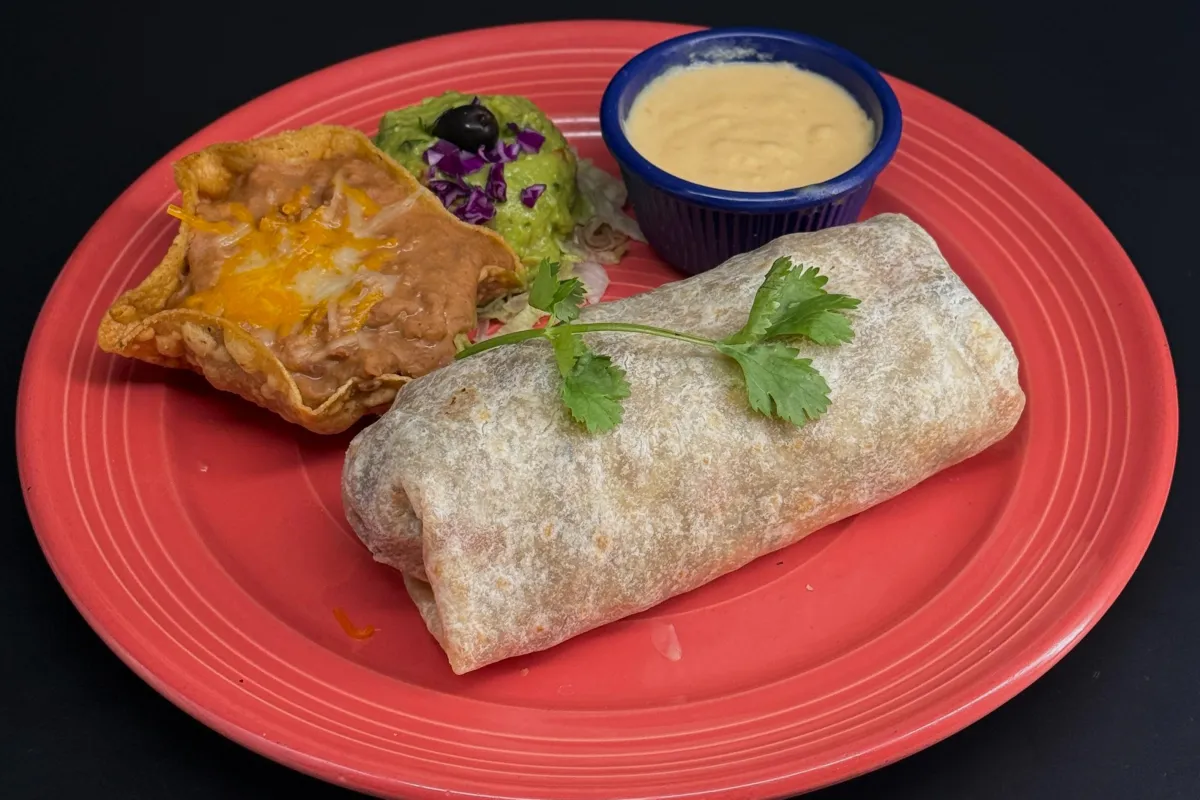 Mexican Trio: Our dipping trio consists of fresh guacamole, jalapeño cheese sauce, and a Mexican bean dip made with salsa Quemada and melted cheese.