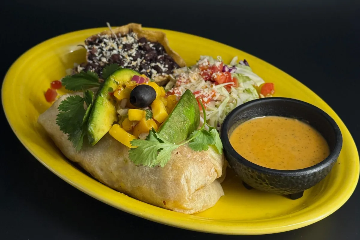 Grilled chicken, avocado & mango burrito at Casa de Bandini—menu photo