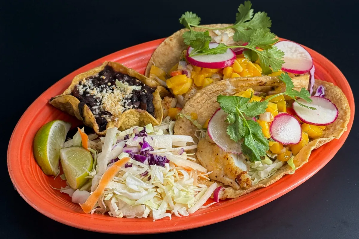 Tacos de Pescado Tropicales plated dish at Casa de Bandini—menu photo