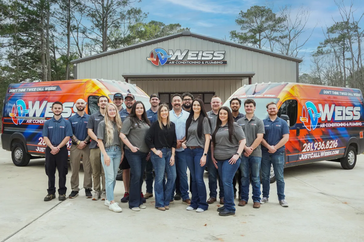 a couple of air conditioners sitting next to each other