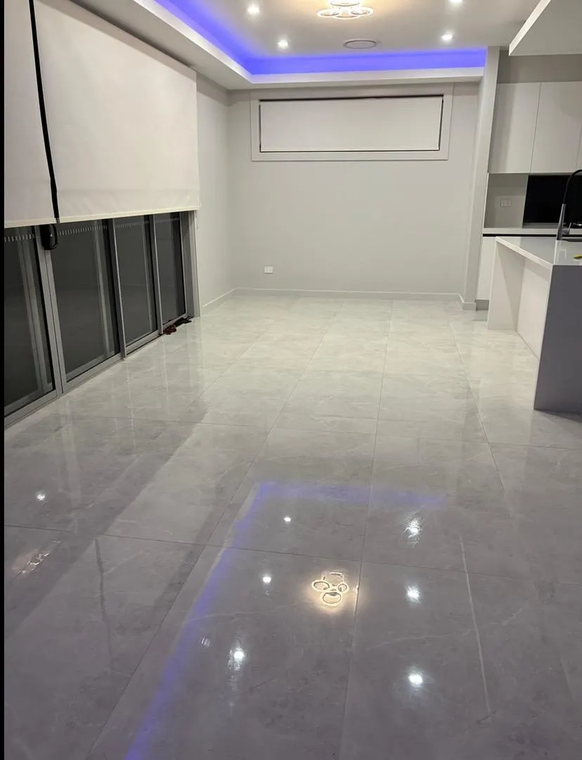 A cell phone sitting on top of a desk