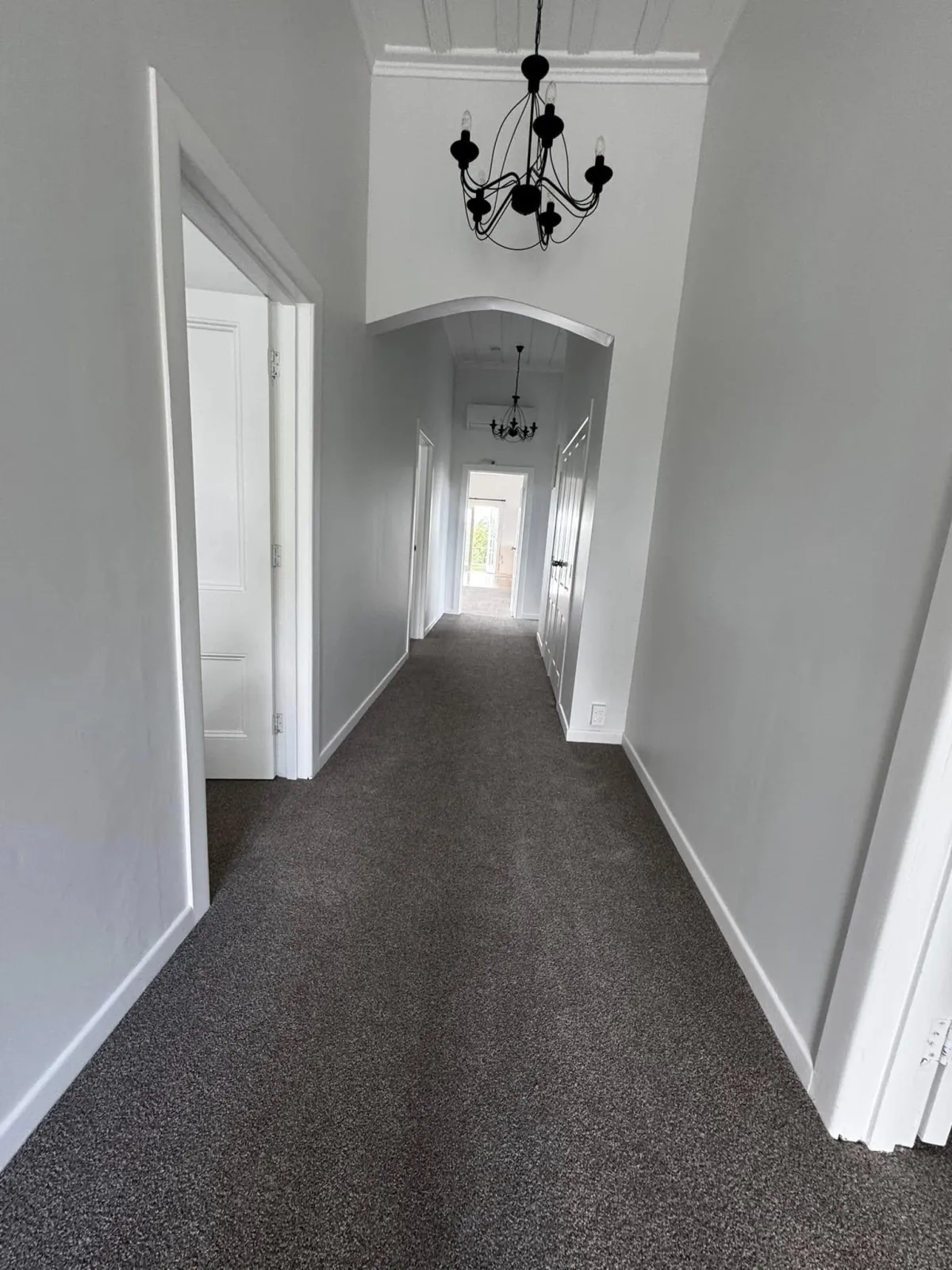 Crisp white interior hallway freshly painted by RAK-B Painters in Waikato