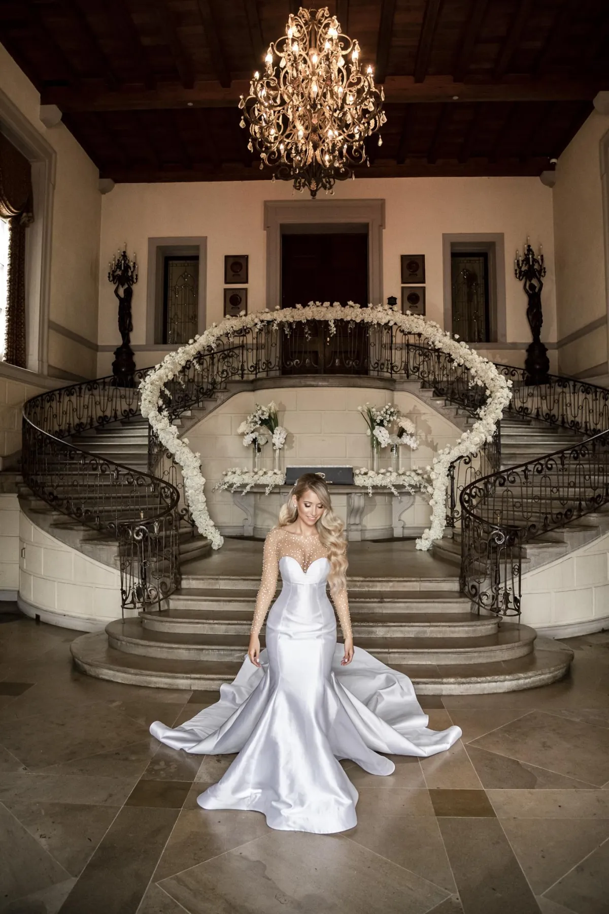 Oheka Castle wedding photographer bridal portrait at grand staircase inside castle Long Island NY by Lotus Wedding Photography