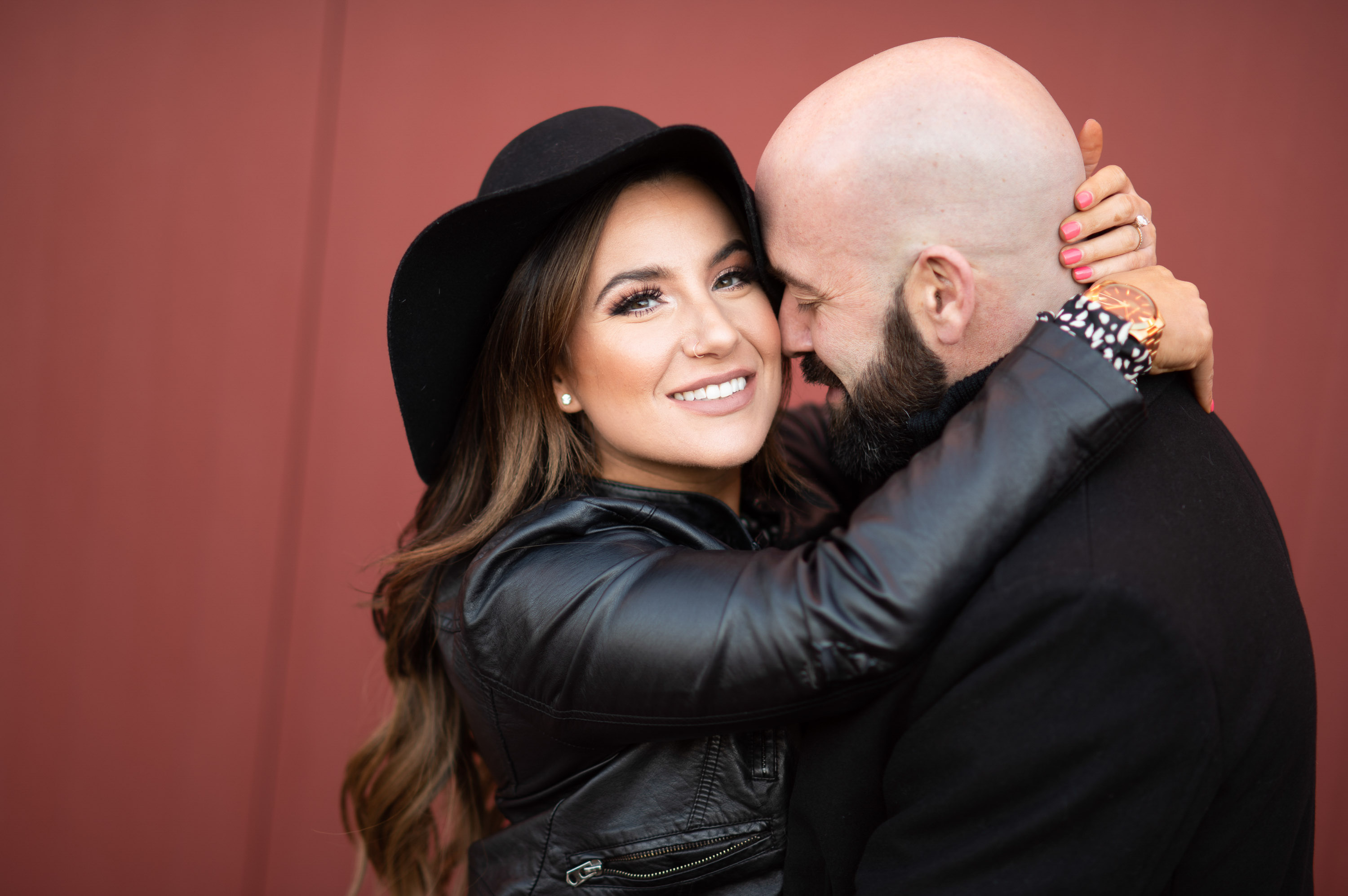 stylish urban engagement photo of couple embracing in Dallas Texas photographed by Dallas engagement photographer Lotus Wedding Photography
