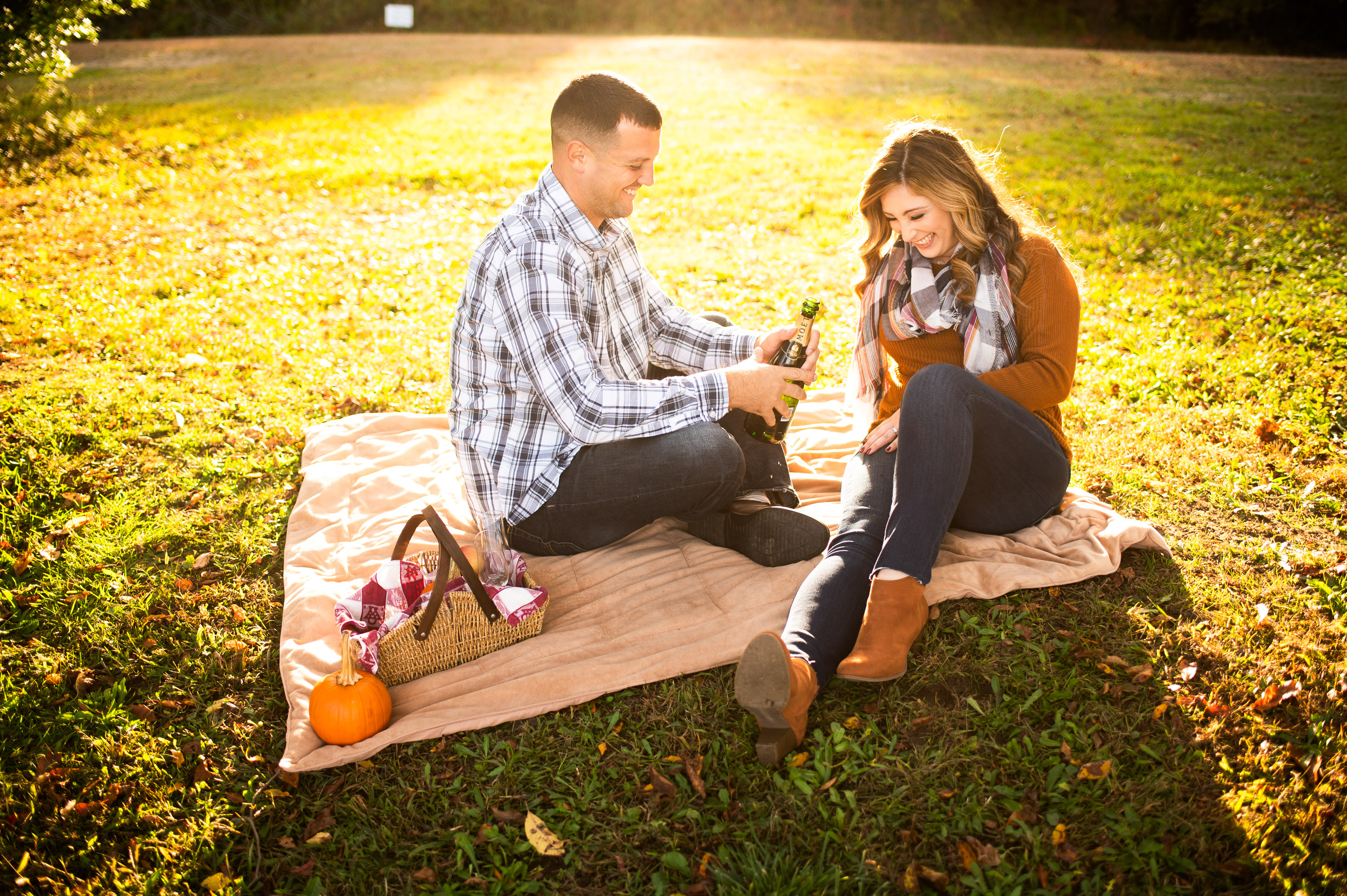 omantic picnic engagement photos at White Rock Lake Dallas photographed by Dallas engagement photographer Lotus Wedding Photography
