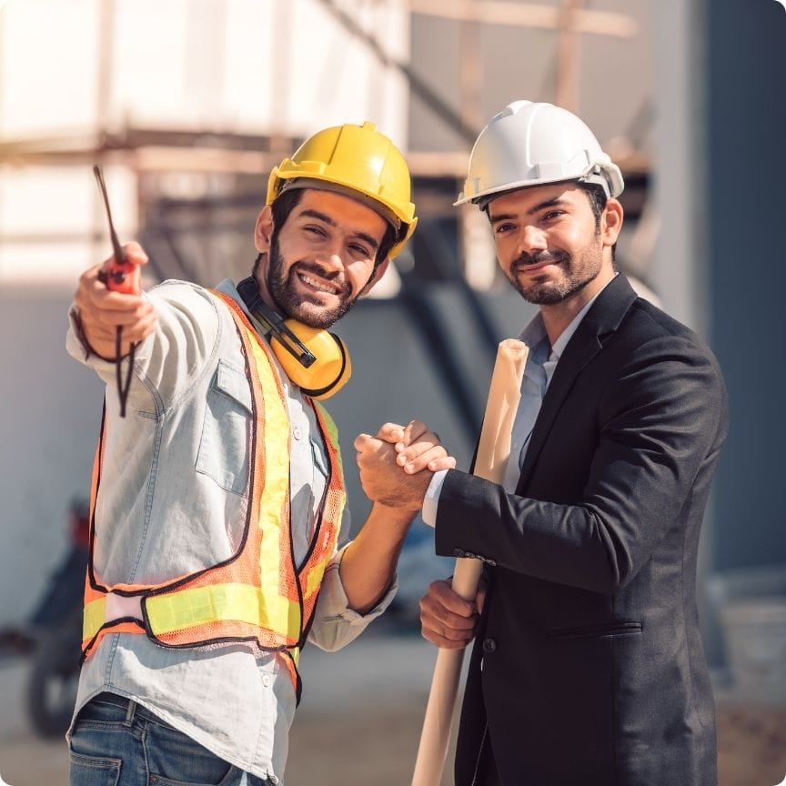 New hire shaking hands with project engineer at a Skilled Labor Contractor construction site in North Georgia