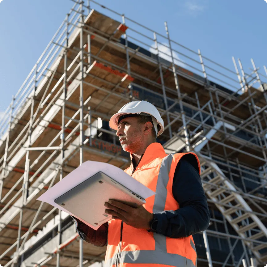 Skilled Labor Contractor field supervisor overseeing a commercial construction project in the Southeast