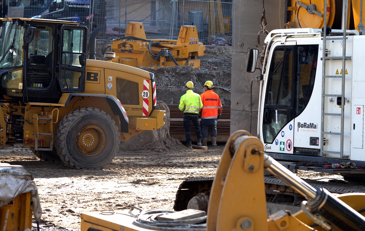 Construction professional inspecting a commercial building project managed by Skilled Labor Contractor