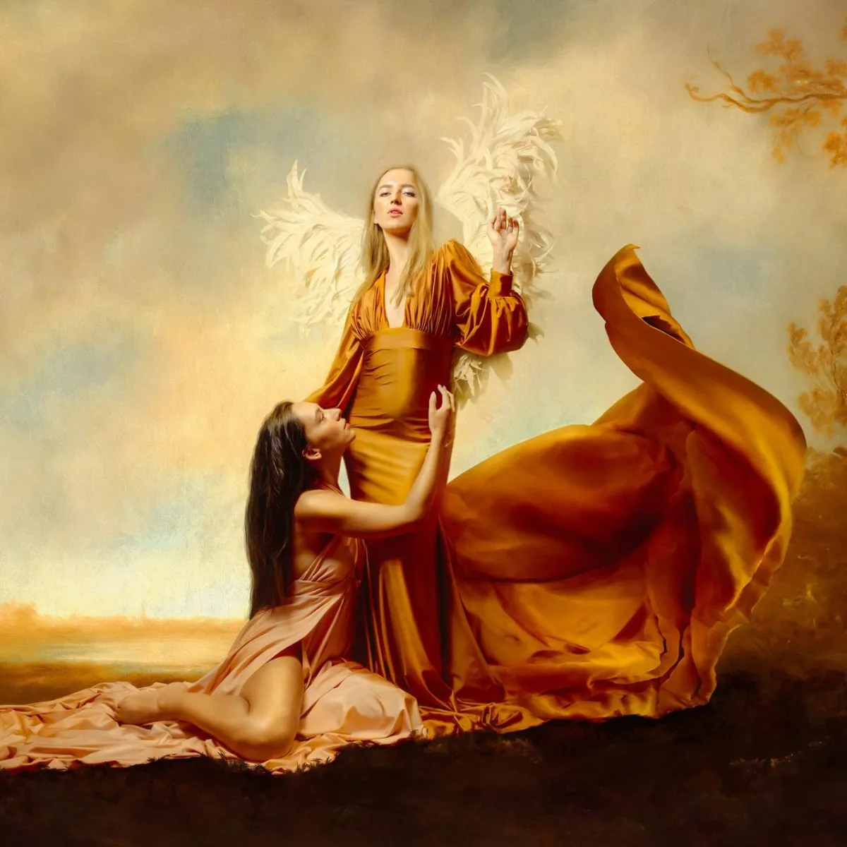 painterly renaissance photo of two women wearing silk gowns and white angel wings