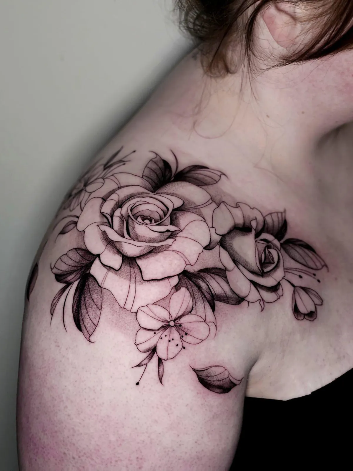 person with tattoo on right arm