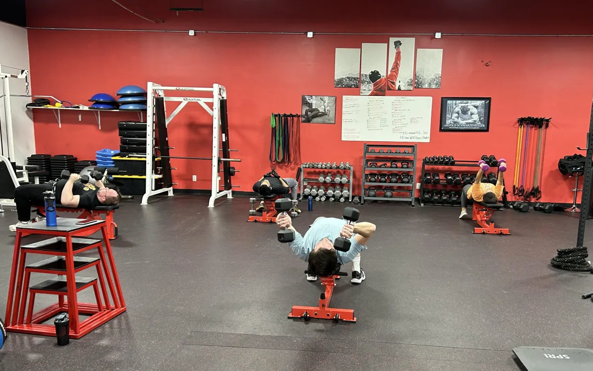 Our Gym Members with coach at Iron Will Fitness Studio in Lexington KY