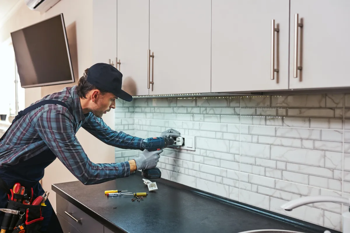 electricity-protection-side-view-of-young-handyman