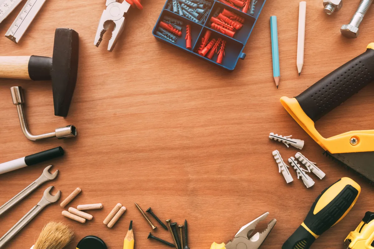 handyman-tools-top-view-on-workshop-desk