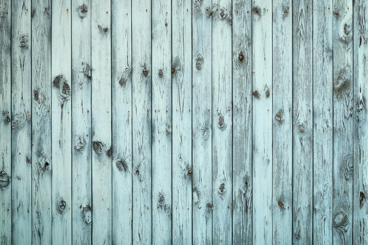 old-blue-wooden-fence-weathered-texture-with-peel