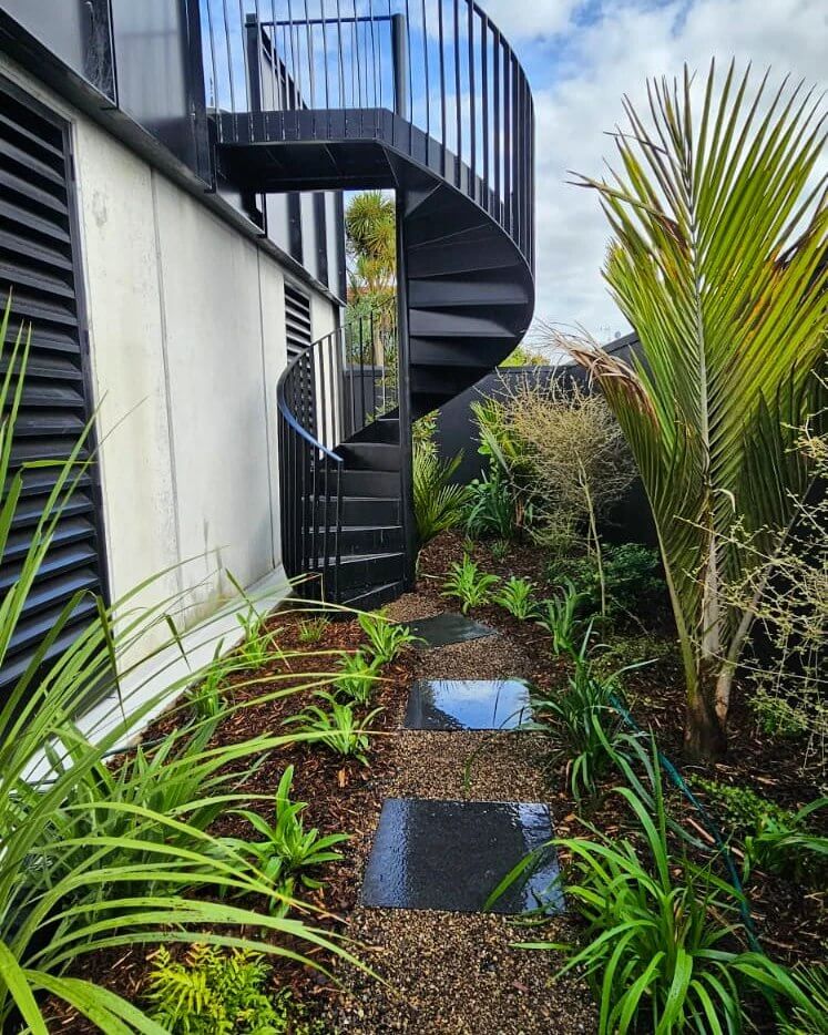 modern garden path with planting and spiral staircase Auckland landscaping