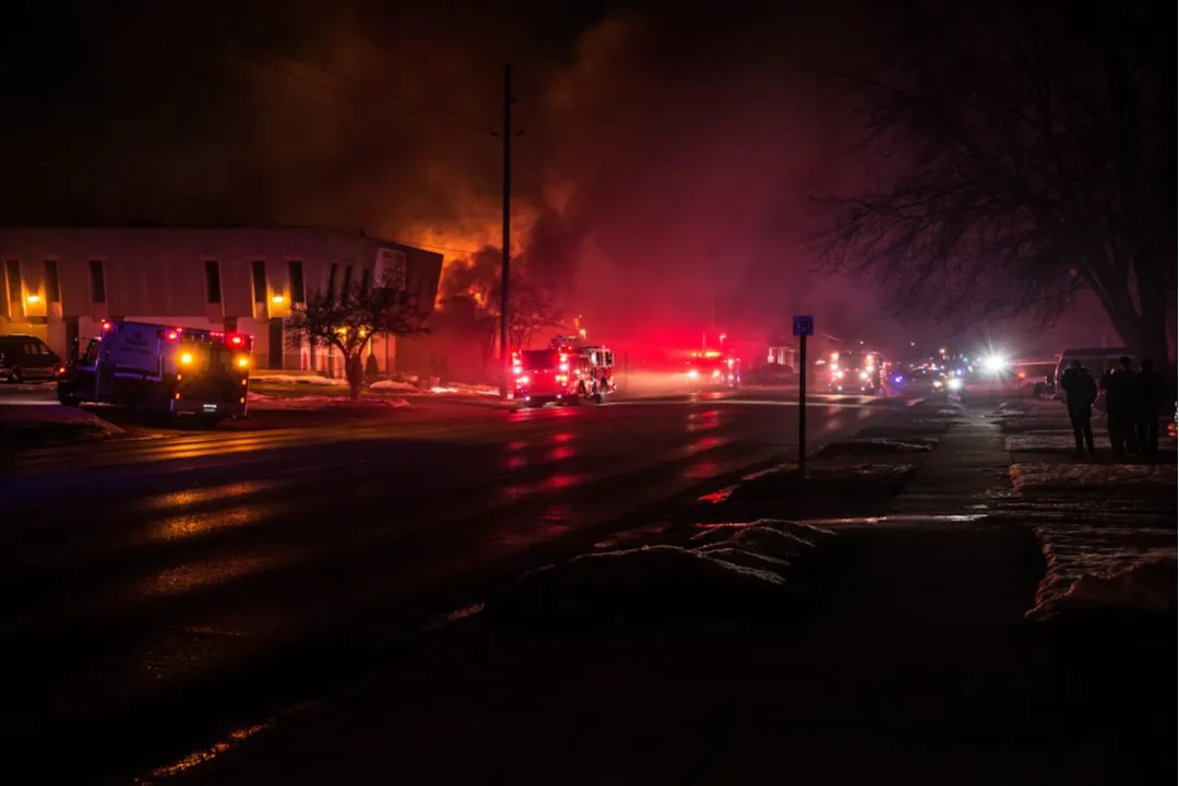 time lapse photography of two firemen