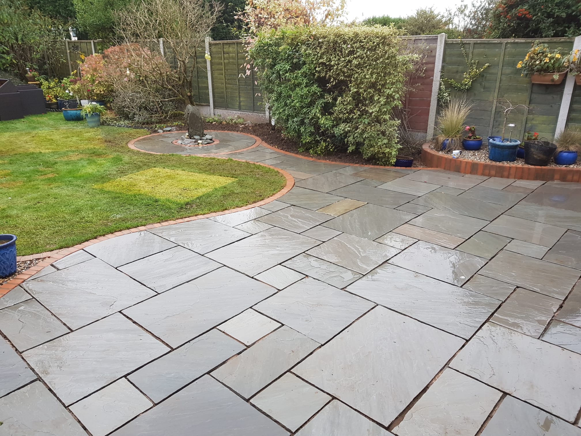 Newly laid patio in a Stourport on Severn garden with clean paving and drainage