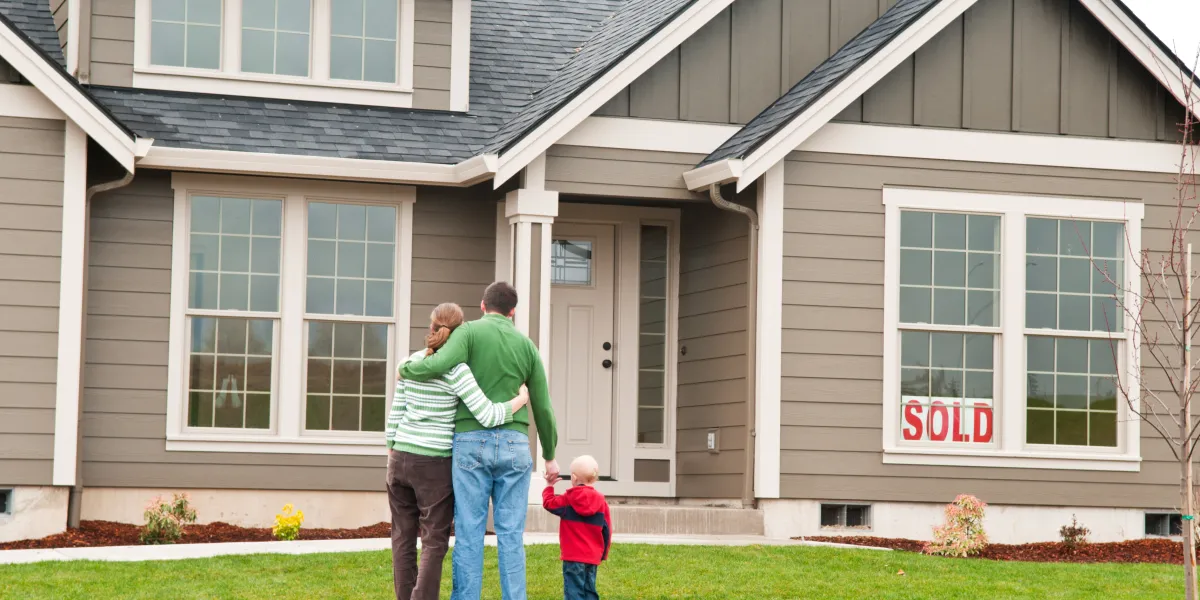 first-time homebuyer in Colorado Springs touring a home with a real estate agent