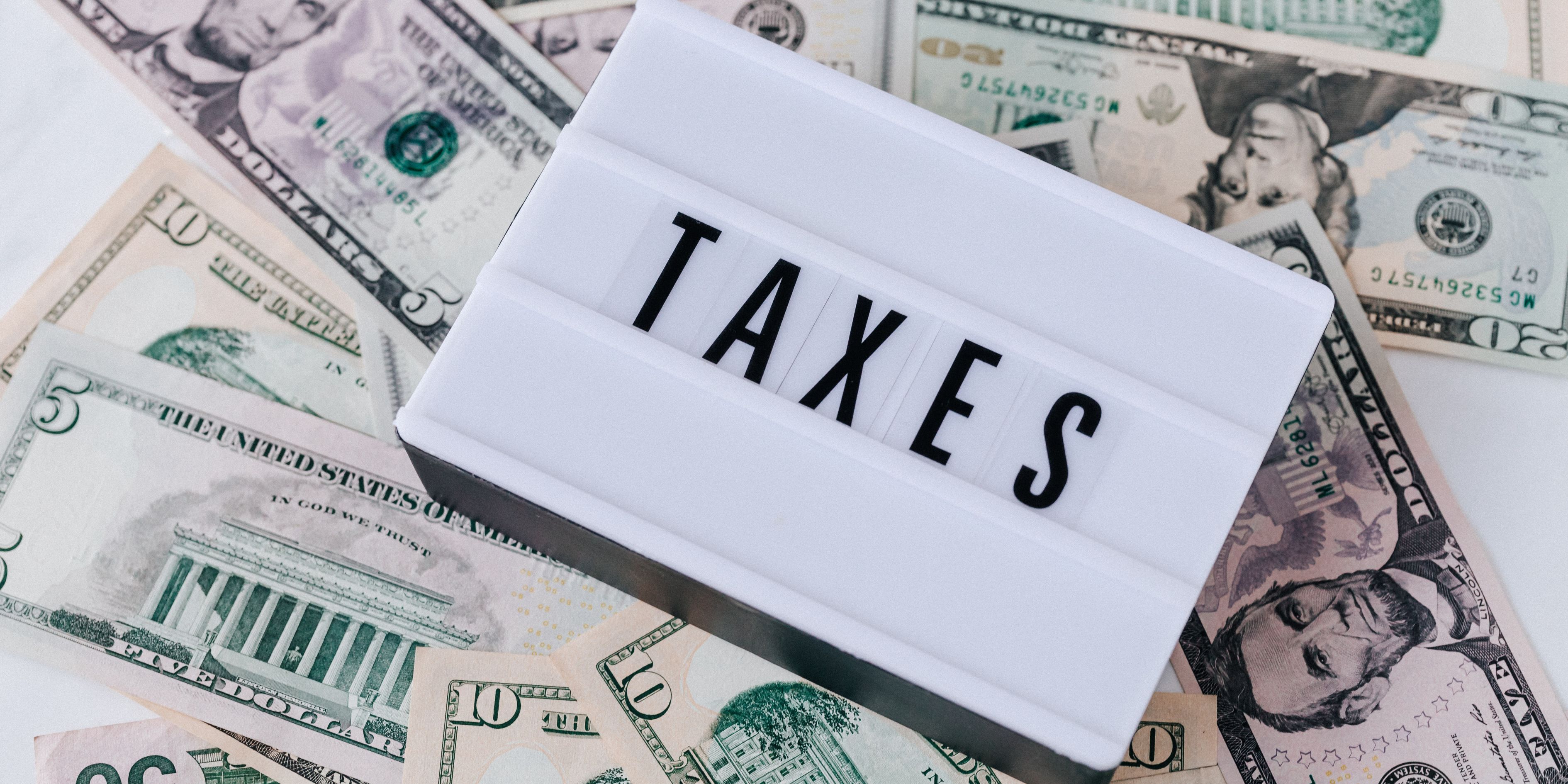 Colorado Springs homeowner reviewing property tax and mortgage payment documents