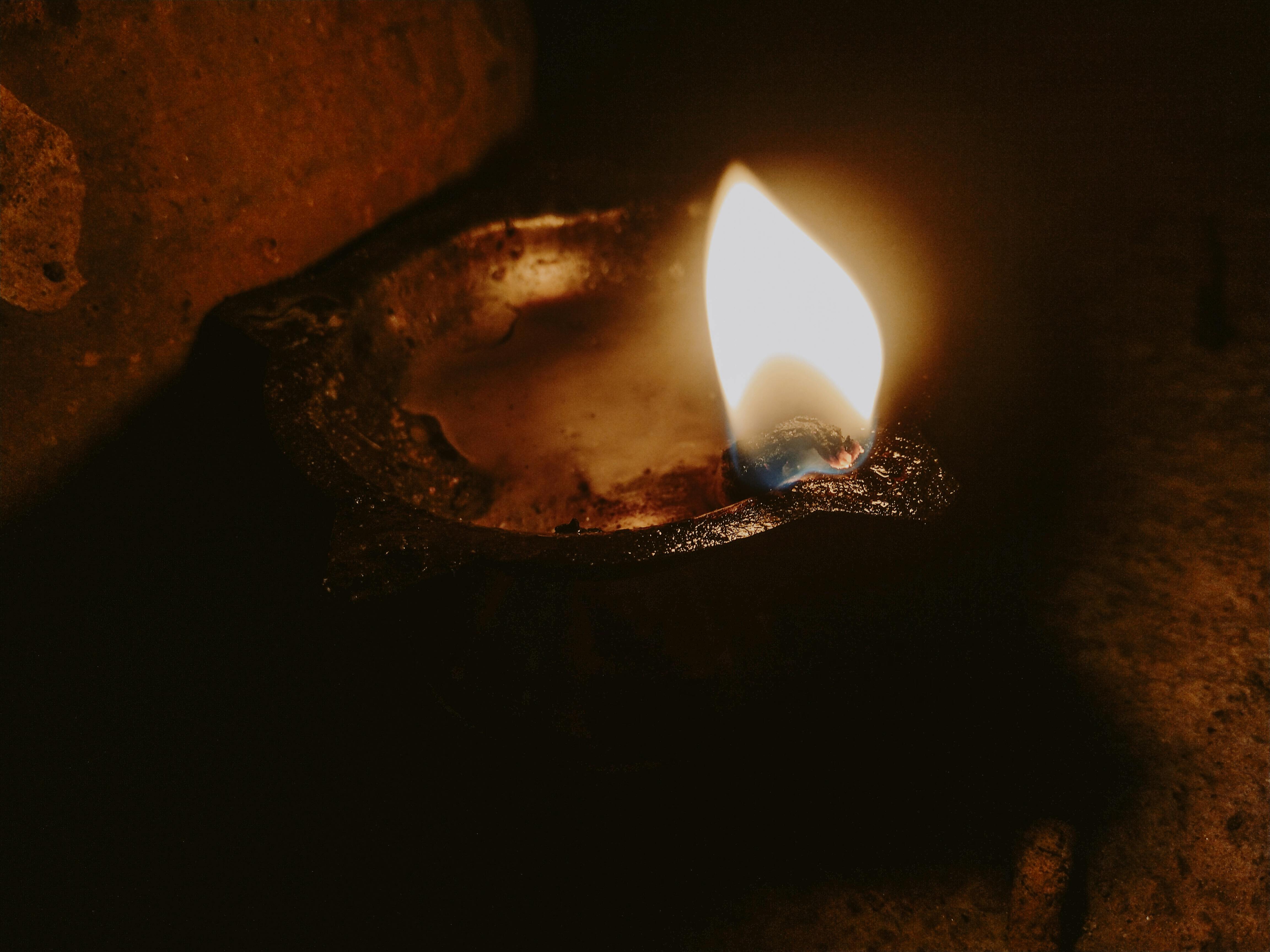 Image of ancient oil lamp in the dark