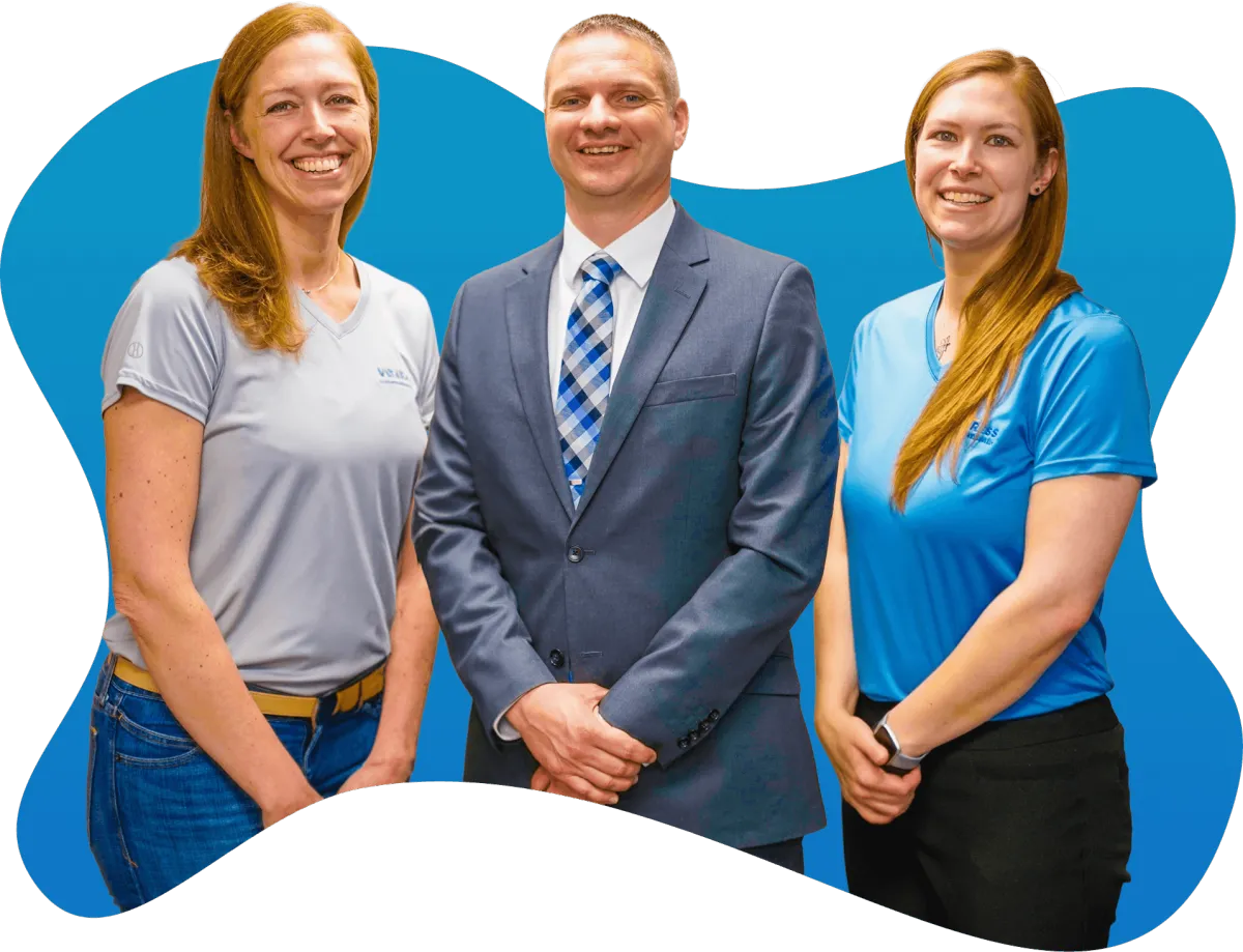 Erin, Bruce, and Lisa (left to right) standing side by side