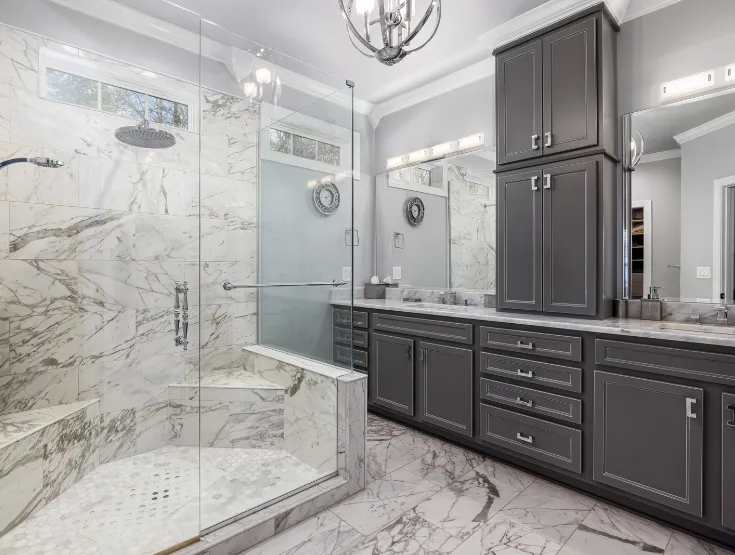 Full bathroom remodeling project with marble shower and double vanity in Maryland