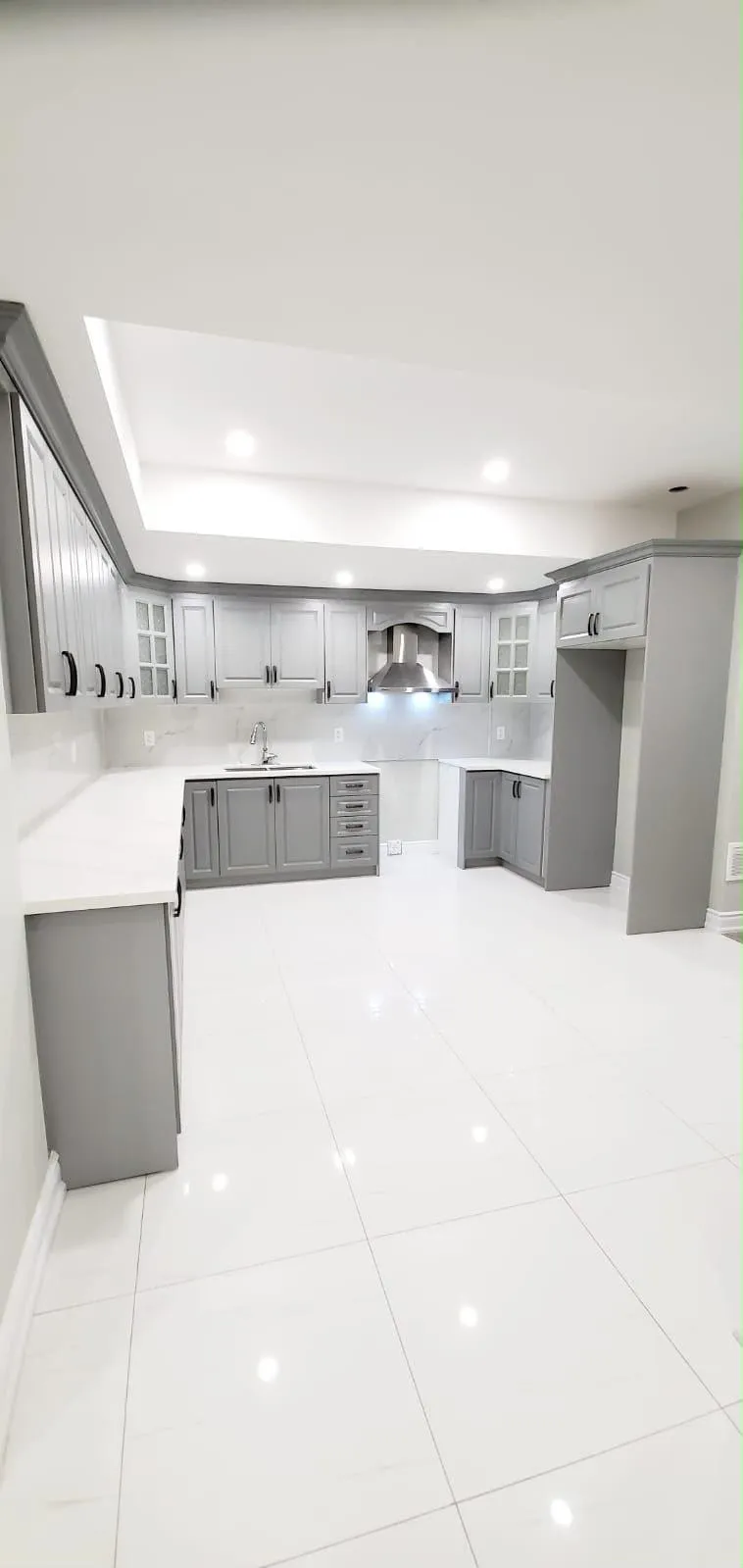 Featured Rising Hill grey shaker kitchen and finished basement