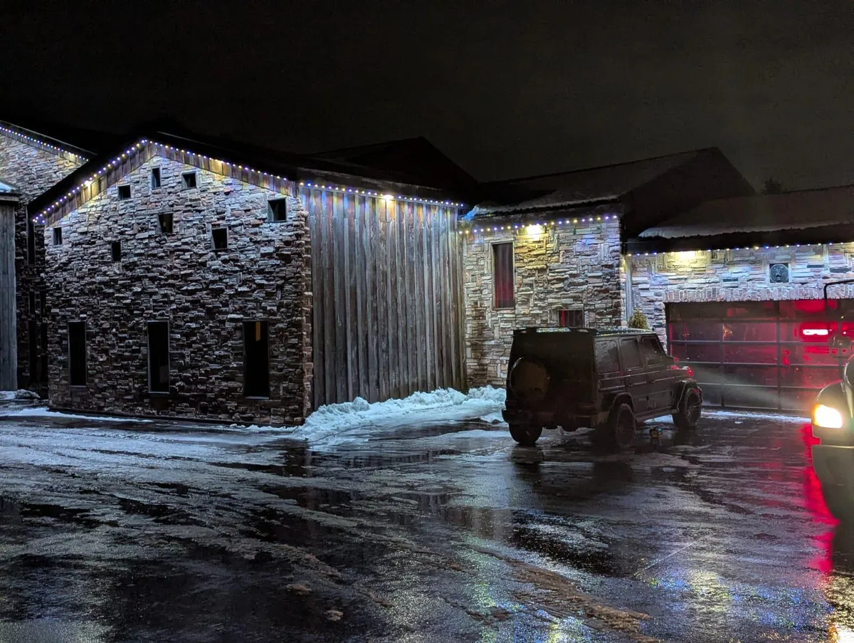 Everyday white permanent roofline lighting on the same home