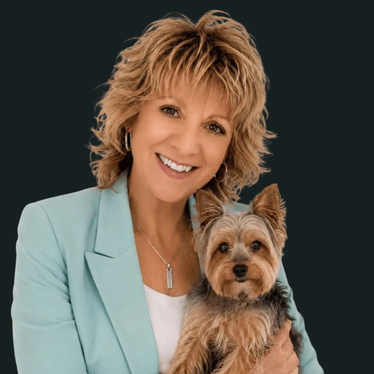 Stephanie Frank holding a Yorkshire Terrier