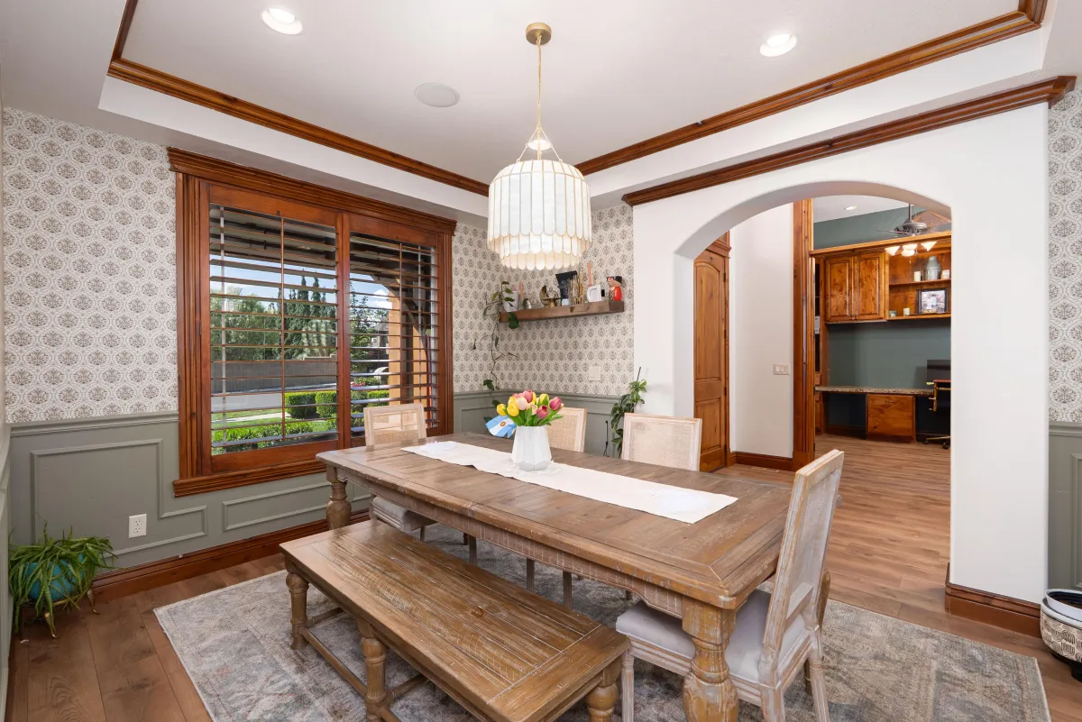 luxury utah home dining room with wooden table and bench
