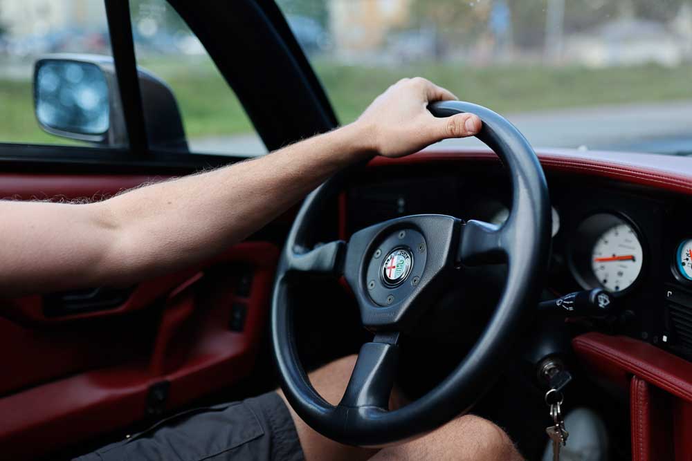 Claes Hoffsten steering the Alfa Romeo RZ