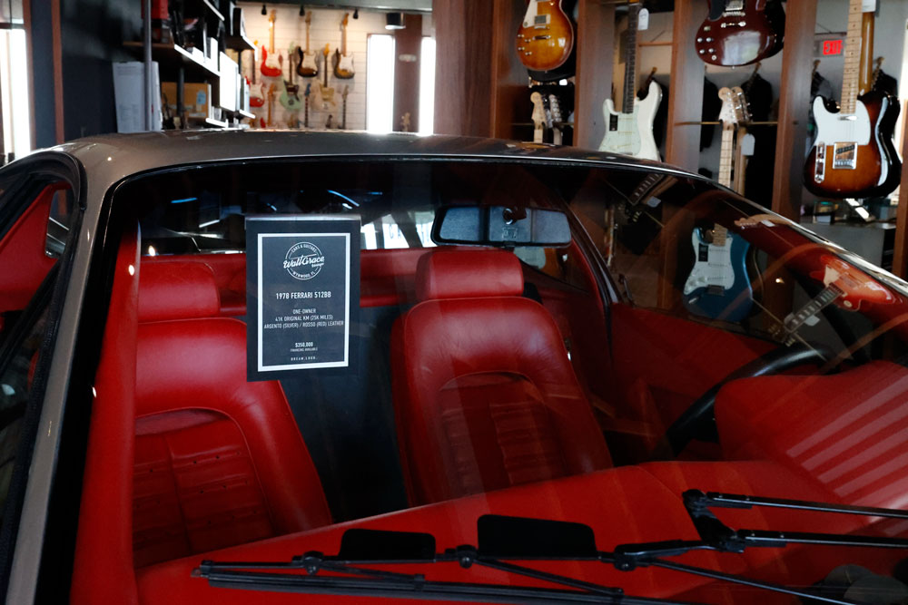 The ferrari 512bb on the stand for sale in Walt Grace Vintage