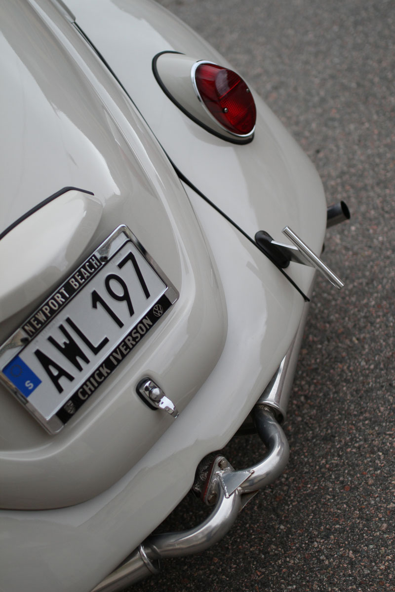 the rear end of cal look beetle with exhaust hanging out