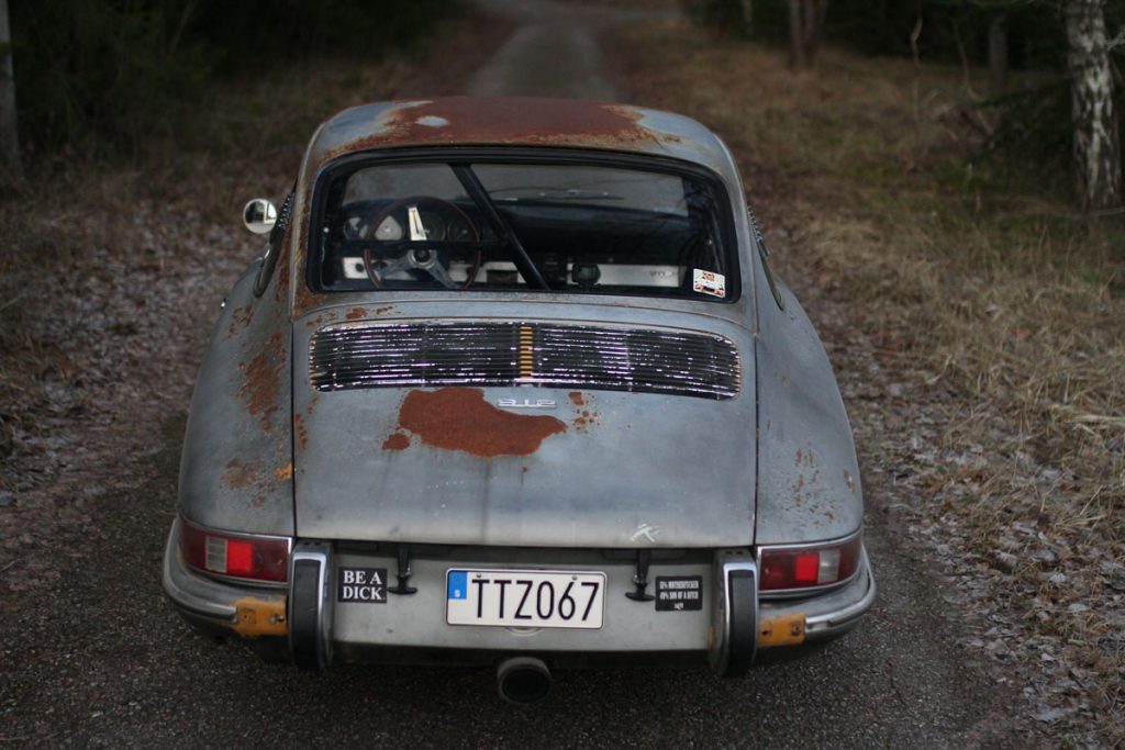 The rear of a patina porsche 912