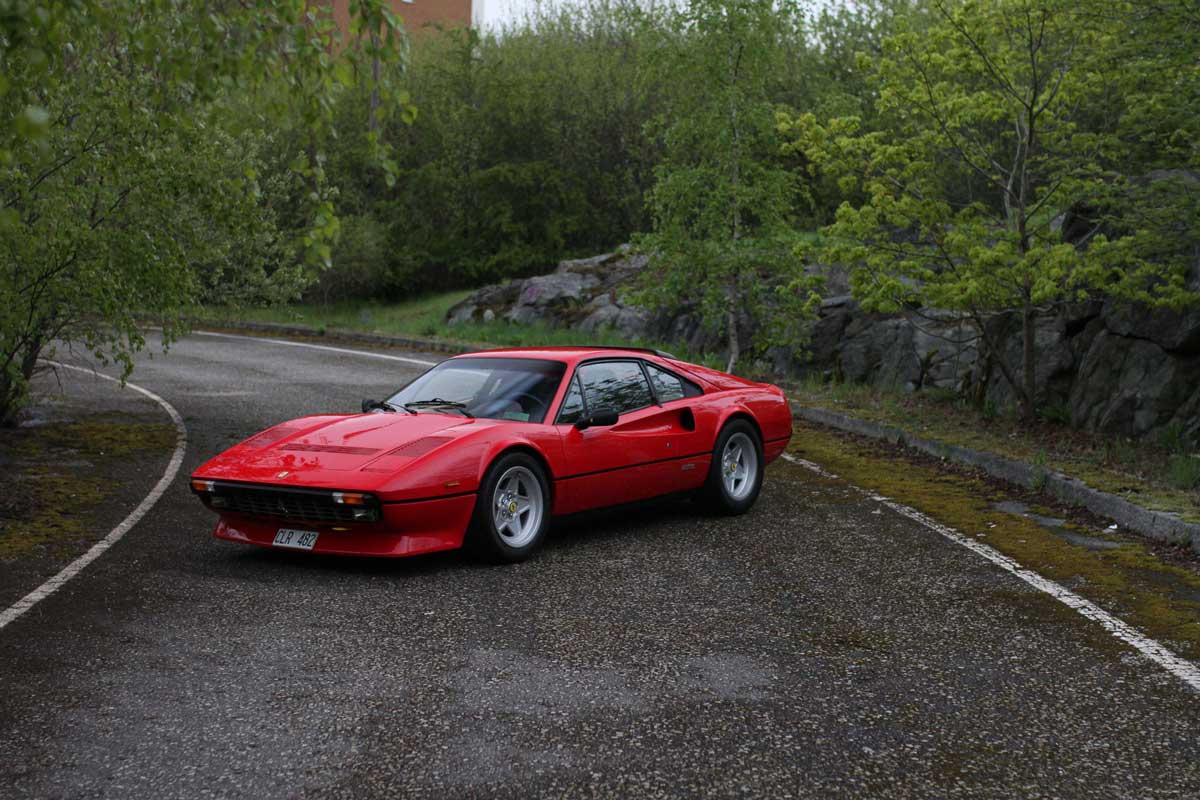 Ferrari 308 GTB QV 1984 alone in the forest