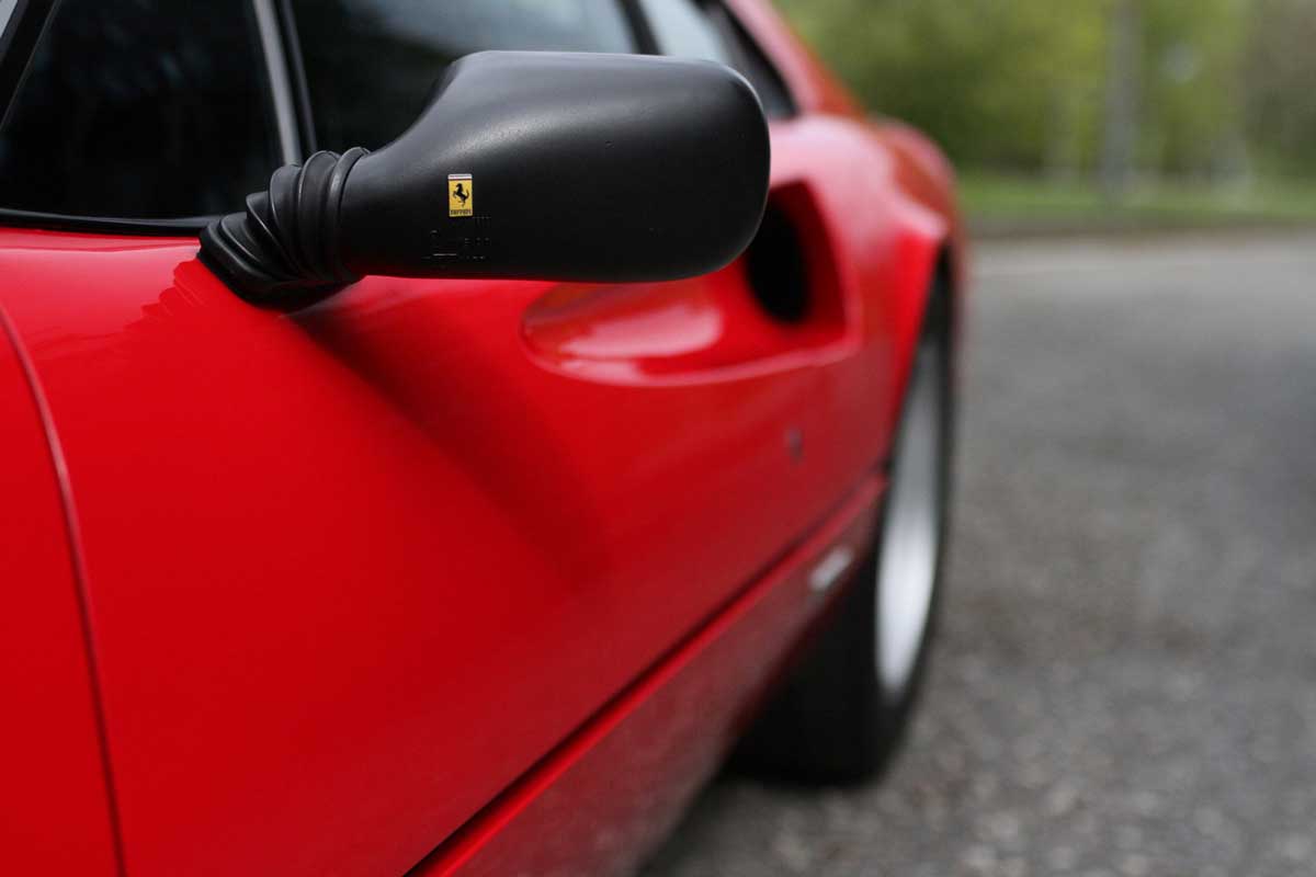 side mirror of a ferrari 308 gtb