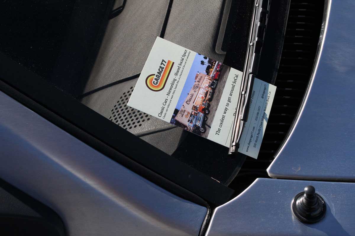 garage 77 sticker in a delorean