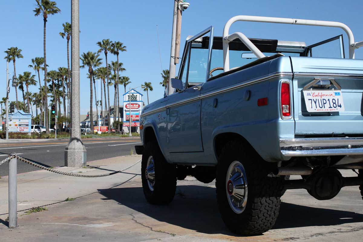 ford bronco light blue outside garage 77