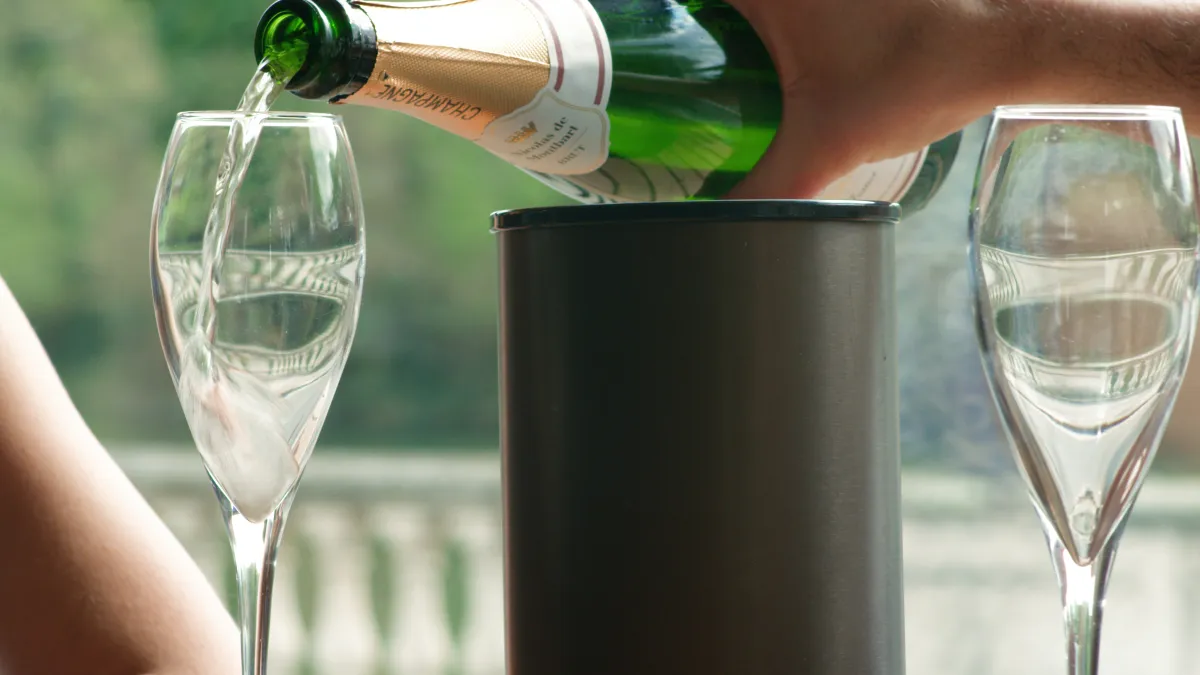 Champagne being poured into a wine glass, freshly cooled by The Hielo