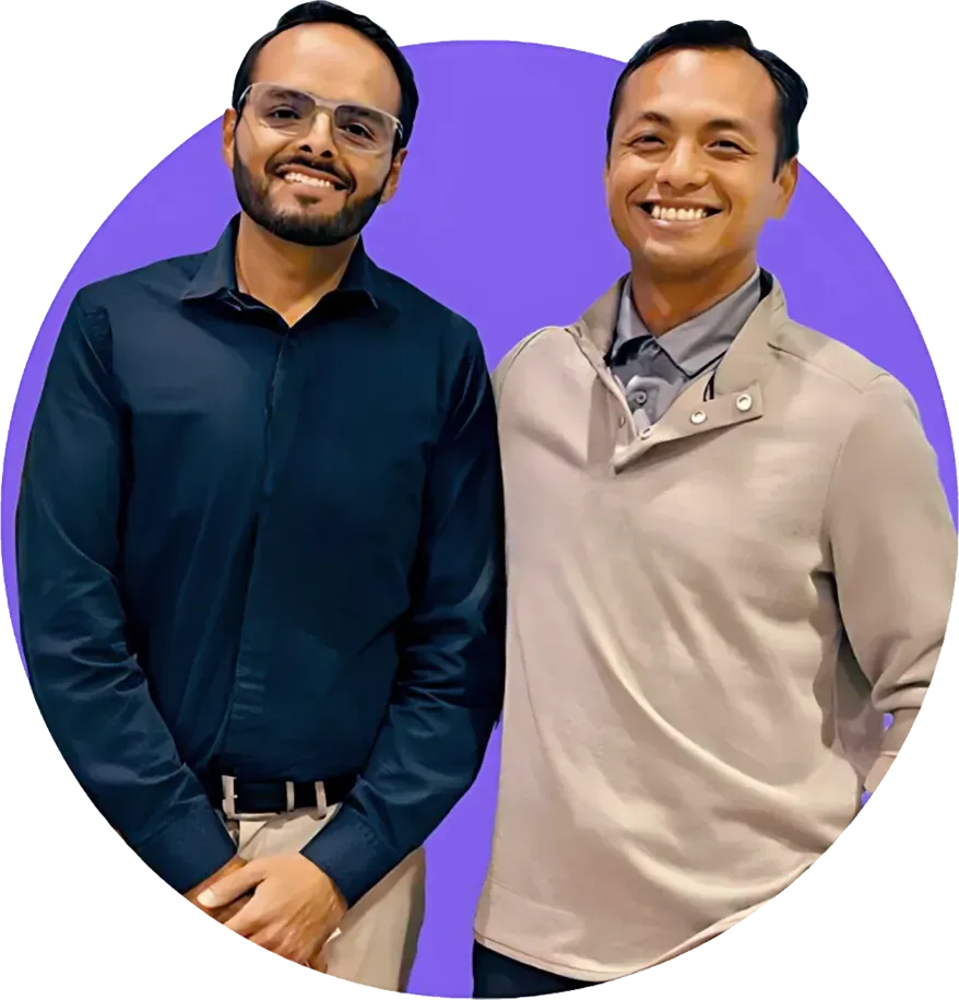 Javier Romero and Borin Kun, owners of Simplified Web Solutions, smiling together against a purple background, showcasing their leadership and expertise in delivering exceptional Dallas SEO services and local SEO solutions.