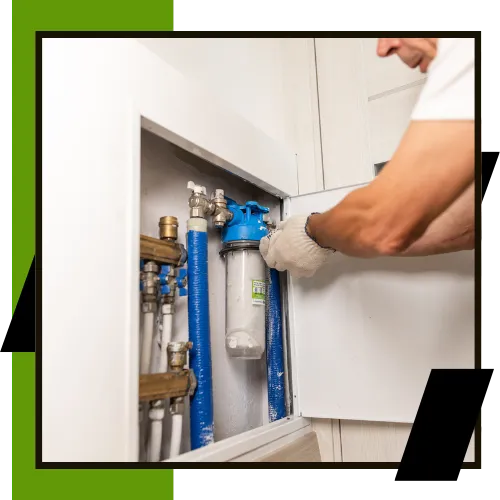 Plumber installing a water filter system in a Walnut Creek home 