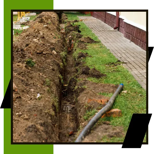 Plumber inspecting a home sewer line before replacement service 